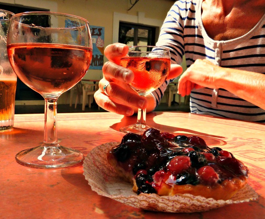 Glass of wine and a pastry